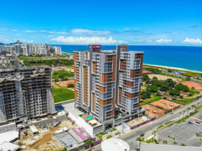 Ap novo em frente a shopping center e próximo a praia
